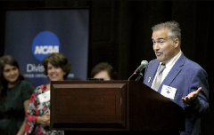Chris Wenzler being inducted into the John Carroll Hall of Fame. Wife Melissa Wenzler can be seen in the background.